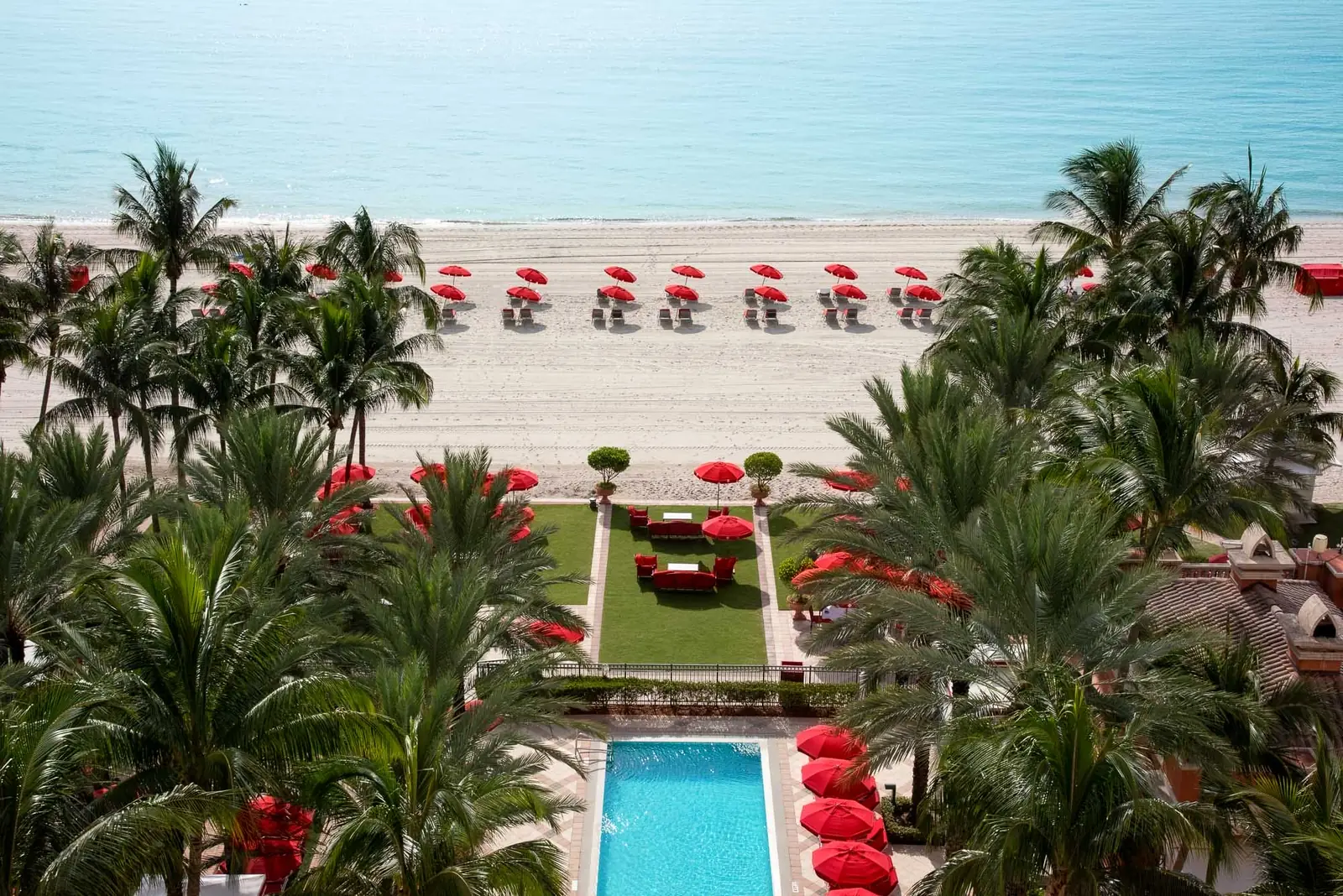 Aerial of the resort lawn, pool and beach